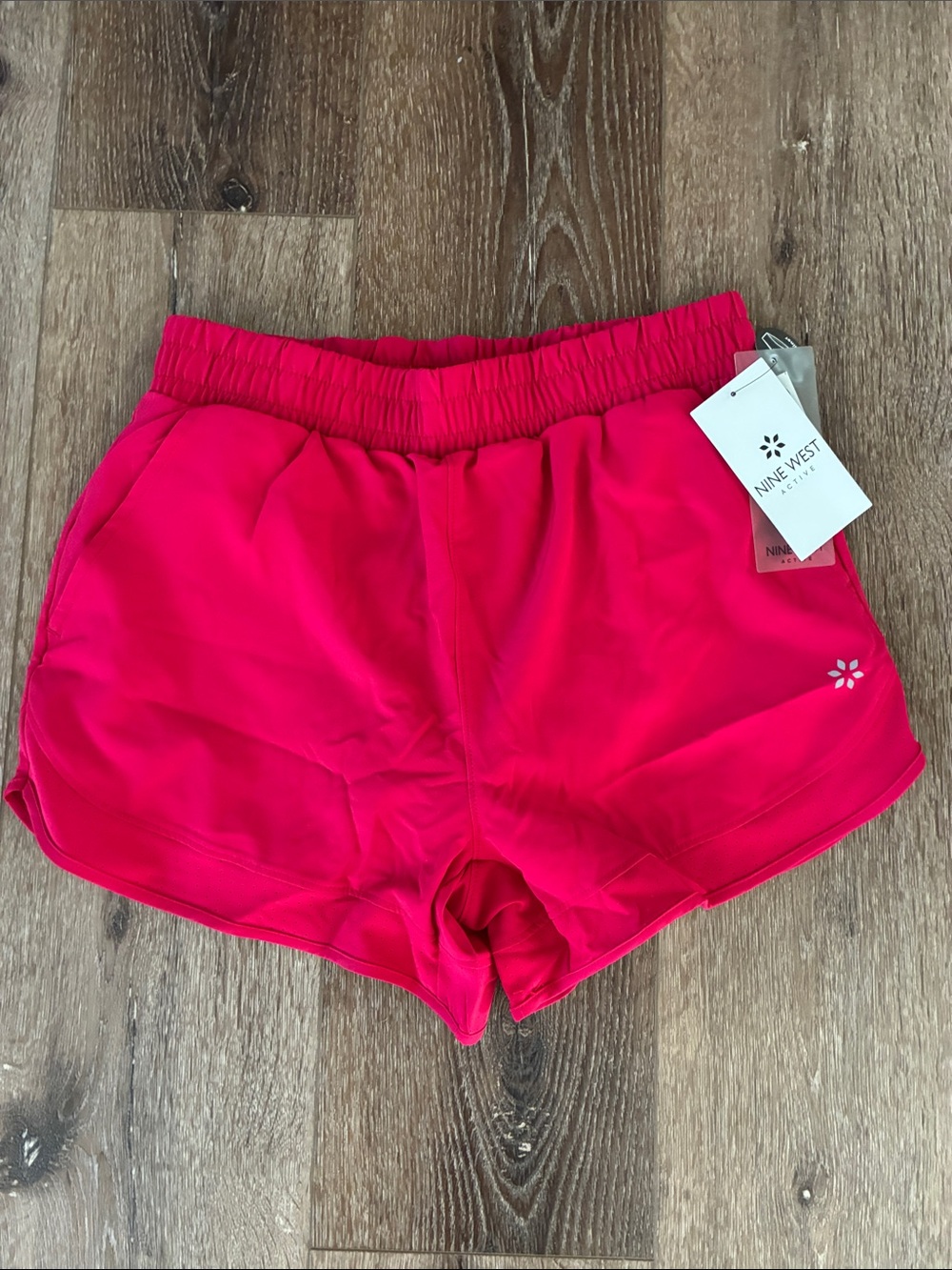 Nine West Women’s Active Shorts with built in liner and pocket. Berry color. New